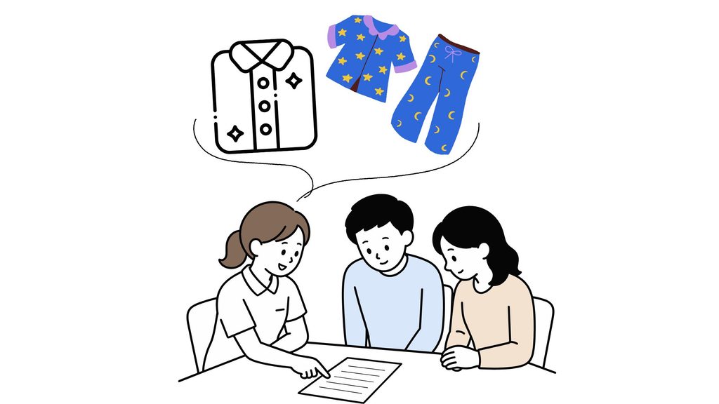 職員が要介護者の家族と衣類のことについて話し合っている
